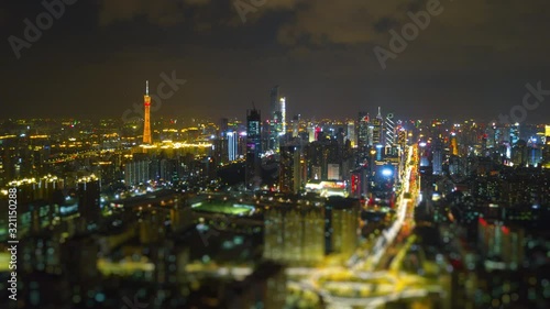Wallpaper Mural night time illuminated guangzhou cityscape traffic road junction aerial tilt shift panorama 4k timelapse china Torontodigital.ca