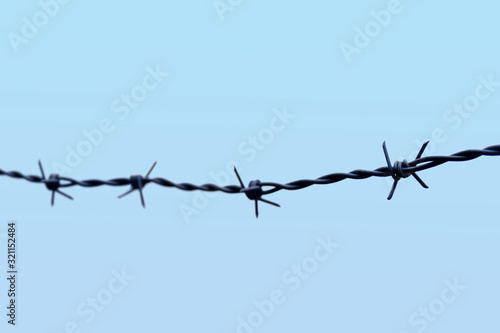 Barbed wire for imprisonment for offenders.Barbed wire for the siege area. © kittyfly