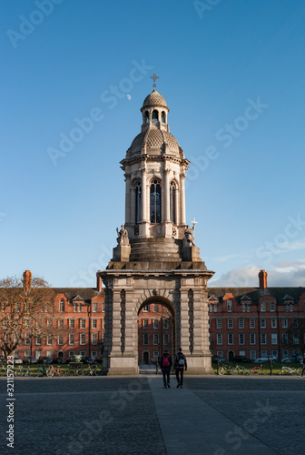 Photography Students walking through the grounds of Trinity collage in Dublin city centre,