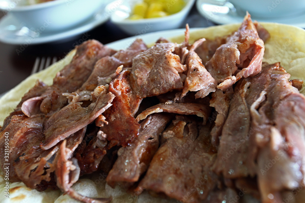 Turkish Doner Kebab with pita in dinner plate Turkish Doner Kebab with pita in dinner plate