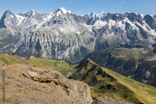 aerial view of mountain range in Bernese Alps above Lauterbrunnen valley in Switzerland