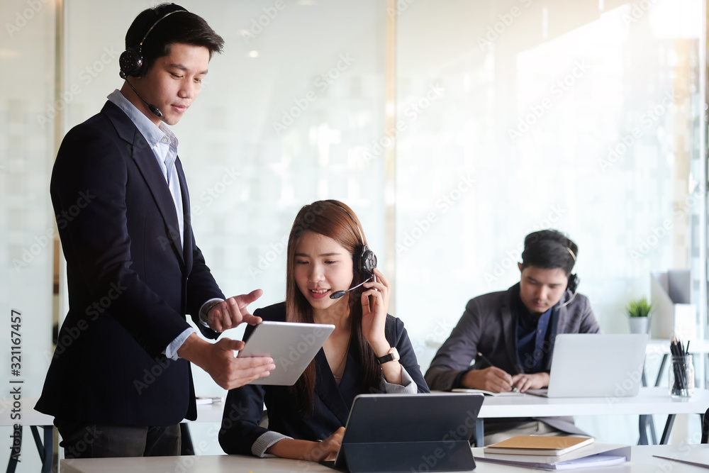 Business working in office with documents and laptop people Consulting and business planning. Business working in office with documents and laptop people Consulting and business planning.