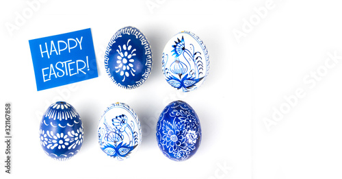 easter eggs with blue and white floral ornaments