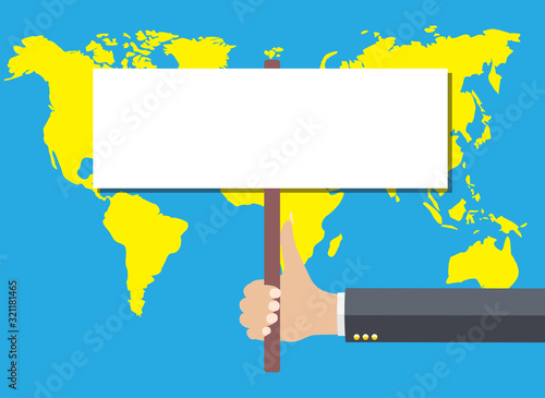Holding a sign on a map of world