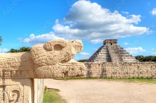 Chichen Itza Snake Head and Pyramid of Kukulcan in Yucatan Peninsula, Mexico