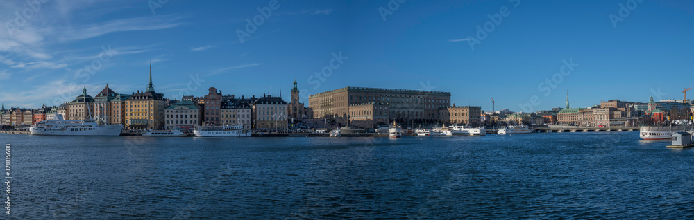 Winter view over the old town of Stockholm, with churches, castle boats and ferries.