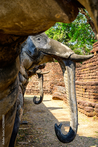 Ancient Elephant Statue in Kamphaeng Phet Historical Park photo