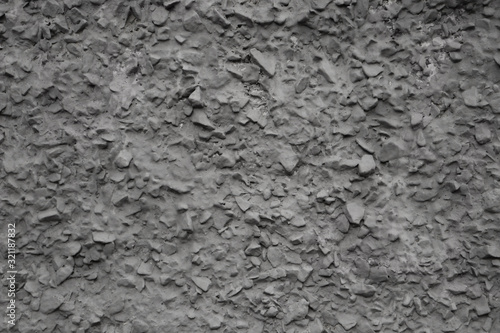 Concrete wall texture with small pebbles
