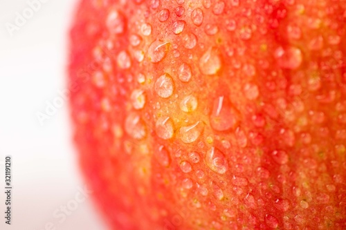 Water drops on apple surface - Apple texture - fresh apple © Ashvinth