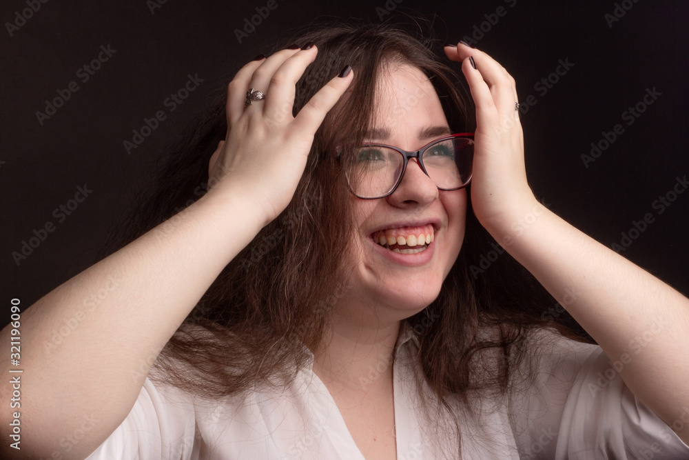 portrait of a plump brunette with long curly hair portrait of a plump brunette with long curly hair