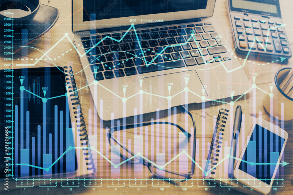 Double exposure of chart and financial info and work space with computer background. Concept of international online trading. Double exposure of chart and financial info and work space with computer background. Concept of international online trading.