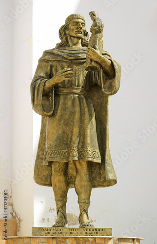 Statue of Francisco Tito Yupanqui at the Basilica of Our Lady of Copacabana, the first saint of Bolivia and the sculptor who carved wooden image of Our Lady of Copacabana, Bolivia photo