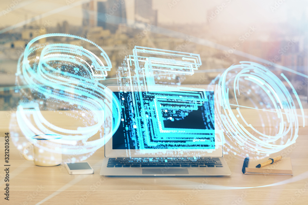 Multi exposure of table with computer and seo drawing hologram. Search optimization concept. Multi exposure of table with computer and seo drawing hologram. Search optimization concept.
