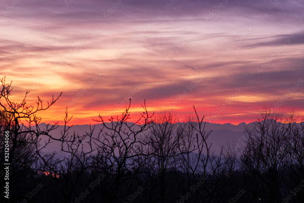 Beautiful sunset on the italian mountains in the Varese region.