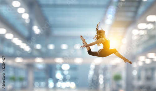 Gymnast girl in jump Mixed ...