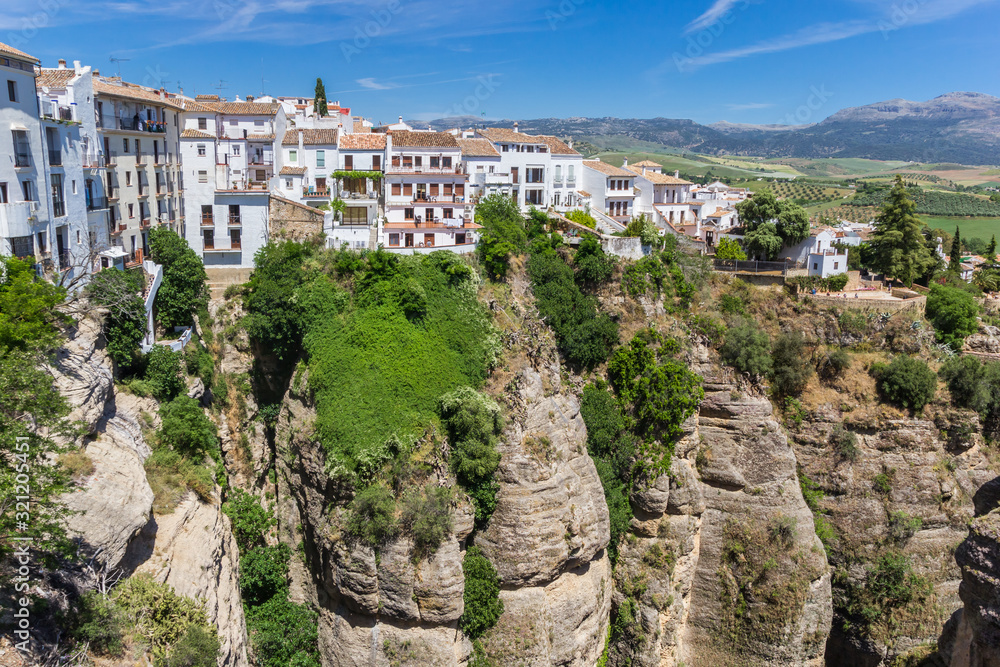 White houses on the cliffs of historic city Ronda, Spain