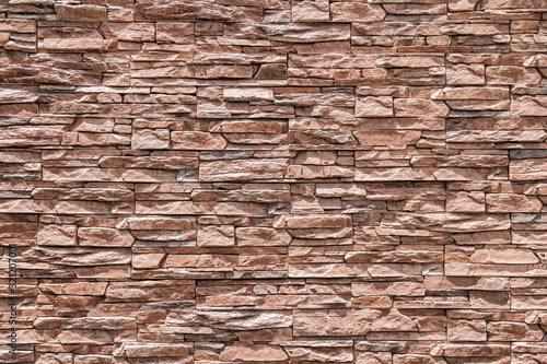 Brown brick wall or stone wall texture and background