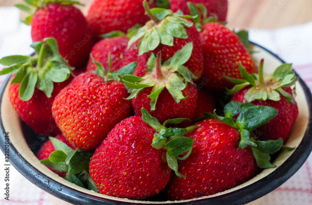ripe red strawberry in a bowl ripe red strawberry in a bowl