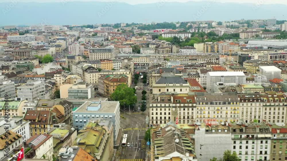 day time geneva city center train station traffic district aerial panorama 4k switzerland day time geneva city center train station traffic district aerial panorama 4k switzerland