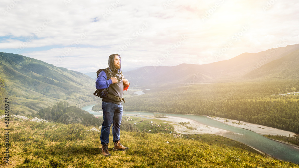 Fototapeta premium Hiker man in mountains. Mixed media