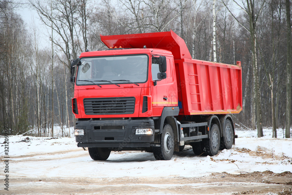 dump truck at construction site during winter