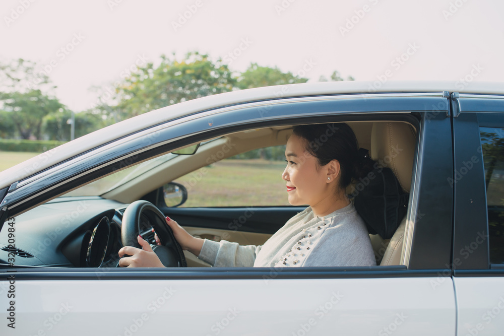 Happy Asian woman driving travel by herself. Happy Asian woman driving travel by herself.