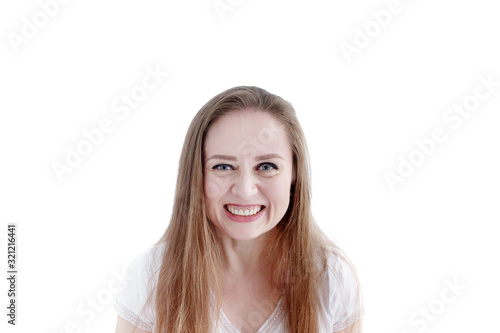 Exited grinning woman with expression on her face, close-up portrait of natural attractive female