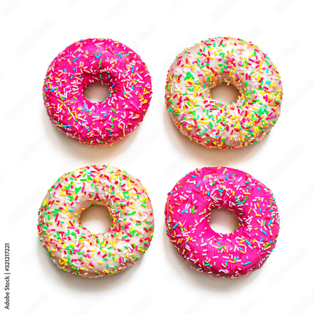 Traditional American doughnuts with pink and vanilla icing, Traditional American doughnuts with pink and vanilla icing,