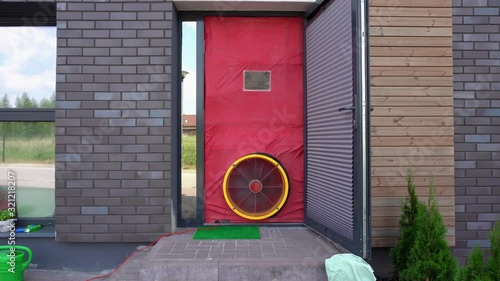 Blower door air tightness test. Passive house certificating. Gimbal movement