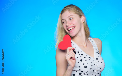You should try it. Romantic greeting. Valentines day sales. Love and romance. woman with decorative heart. Date. happy woman on blue background. Valentines day party. copy space