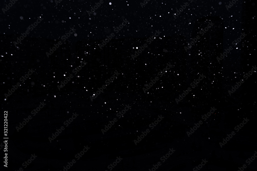 Fototapeta premium snow on a black background. snow texture