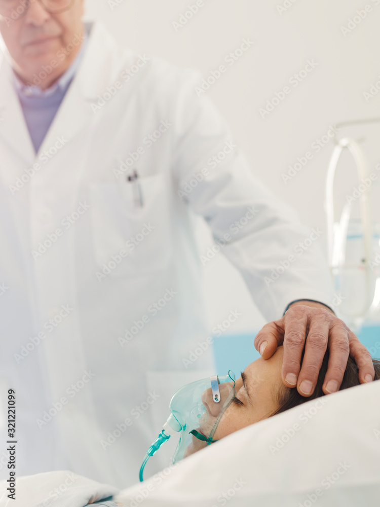 Professional doctor assisting a patient at the hospital Professional doctor assisting a patient at the hospital