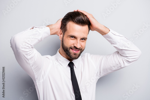 Closeup photo of young macho business man touch perfect groomed hairstyle after salon styling beaming smiling wear white office shirt tie isolated grey color background