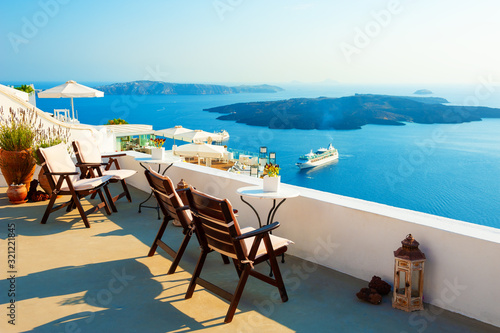 Santorini island, Greece. Beautiful terrace with sea view. Travel destinations concept © smallredgirl