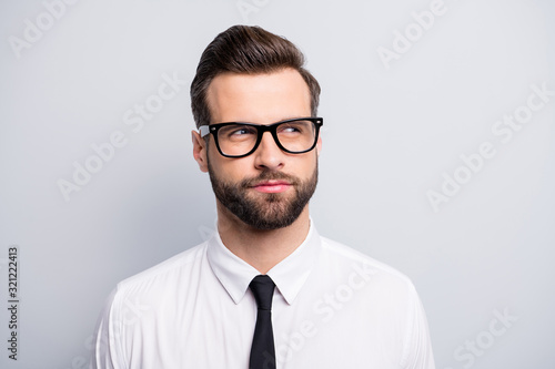 Closeup photo of attractive handsome business man investor looking empty space thinking new project idea wear specs white office shirt tie isolated grey color background
