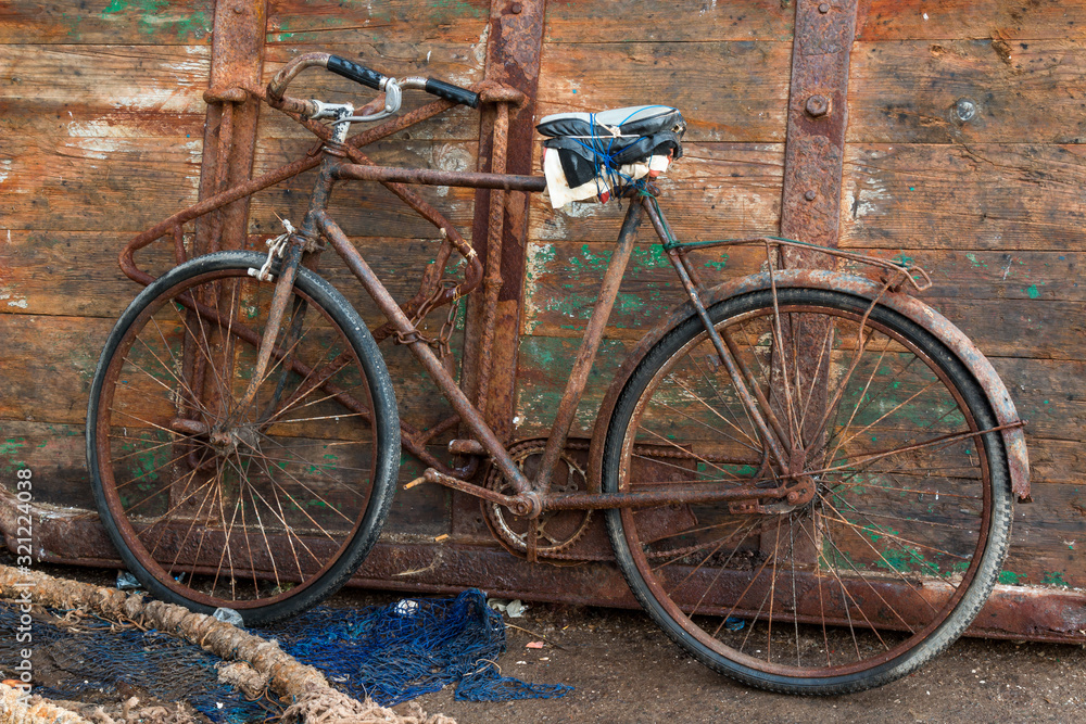 Old rusted bike in the port of Essaouira