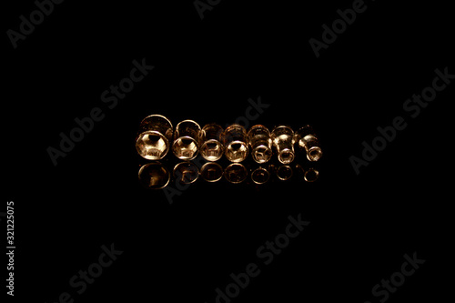 tubular wrench head isolated on black with reflections photo