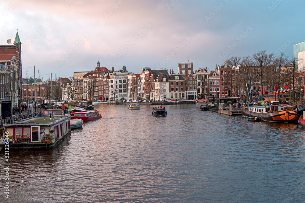 City scenic from Amsterdam in the Netherlands at sunset