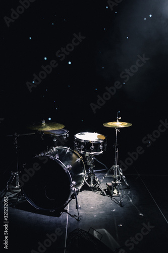 drum set on stage in a concert hall