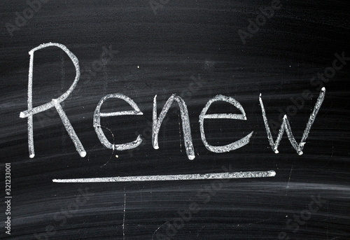 The word Renew written by hand in white chalk on a blackboard