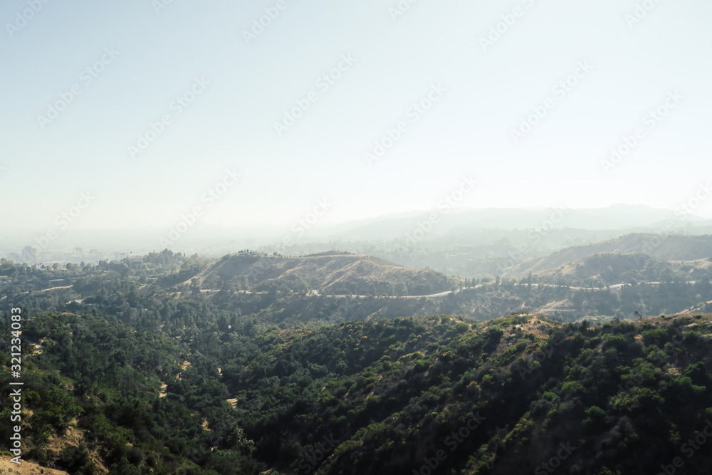 Fototapeta premium Panoramic view of the Hollywood hills from the beautiful Griffith Observatory in Los Angeles