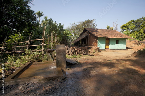 Hindu home at Kuveshi village in Anshi tiger reserve Karnataka, India photo