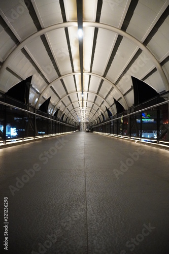 the view of the pedestrian bridge at night