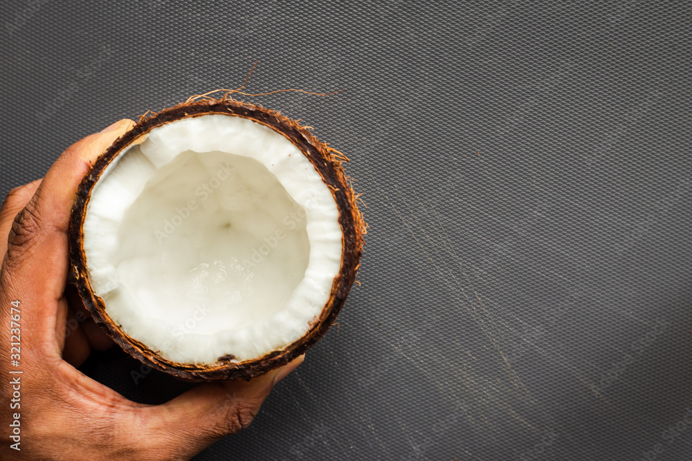 close up of organic coconut in studio - obrazy, fototapety, plakaty 