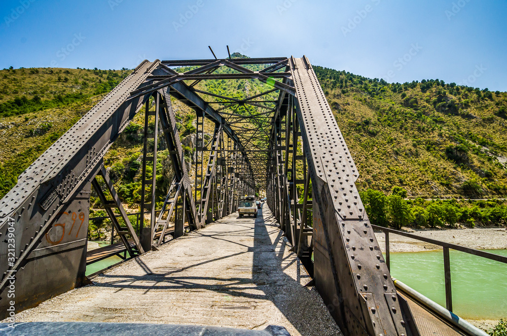 Fototapeta premium Tepelene, Albania - August 02, 2014. Bridge for cars over river near Tepelene