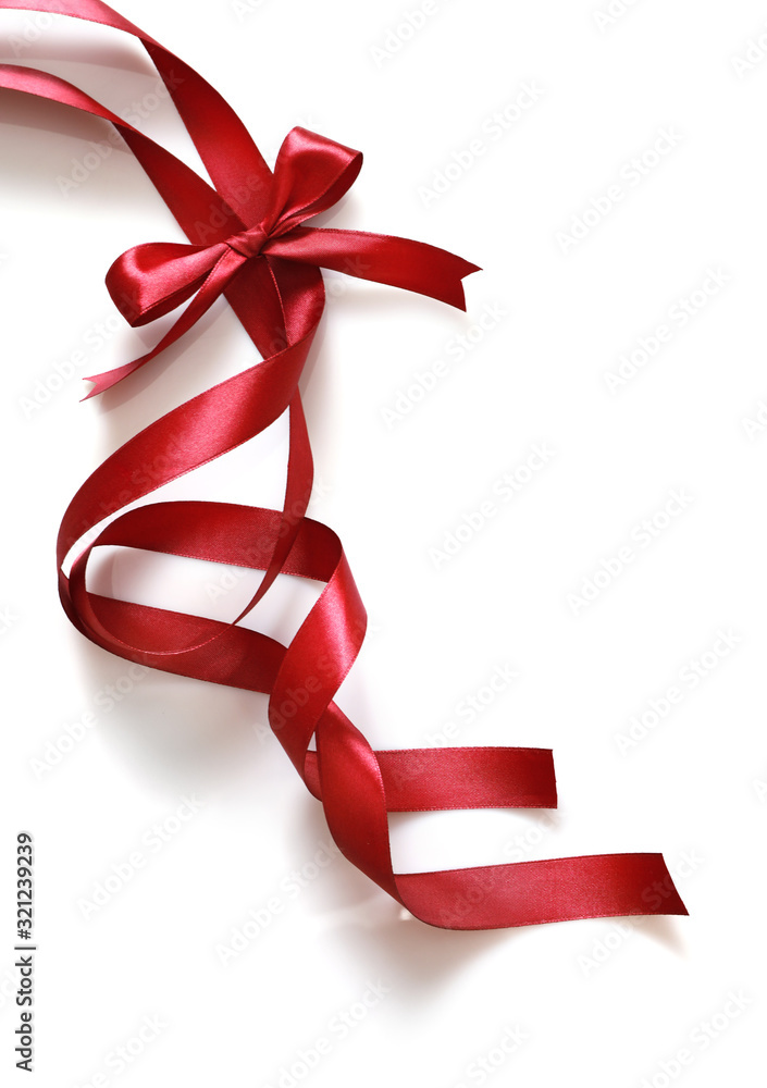 Shiny red satin ribbon isolated on white background Shiny red satin ribbon isolated on white background