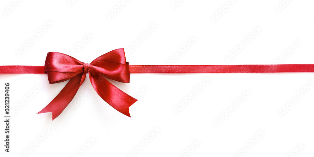 Shiny red satin ribbon and bow isolated on white background Shiny red satin ribbon and bow isolated on white background