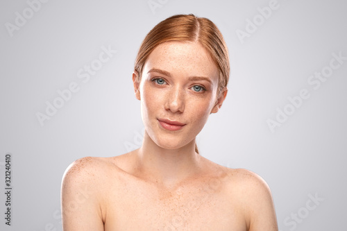 Photography Pretty freckled woman looking at camera
