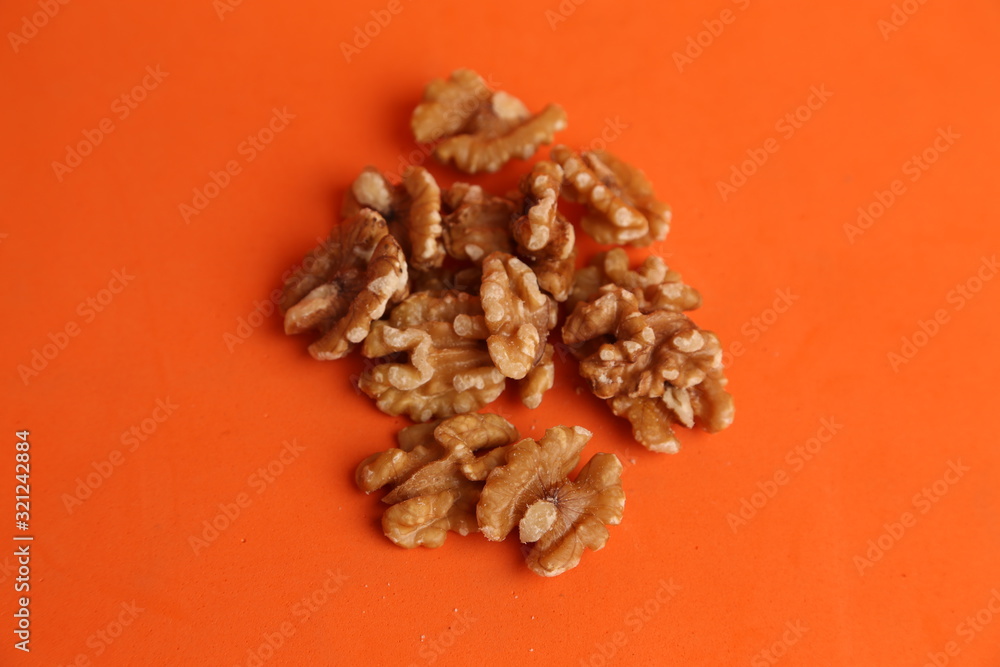 Obraz premium delicious walnut nuts if peel