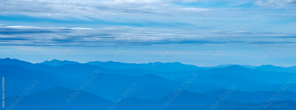 Panorama Aerial view landscape layer of cool nature mountain.Misty Mountain was covered in a layer.